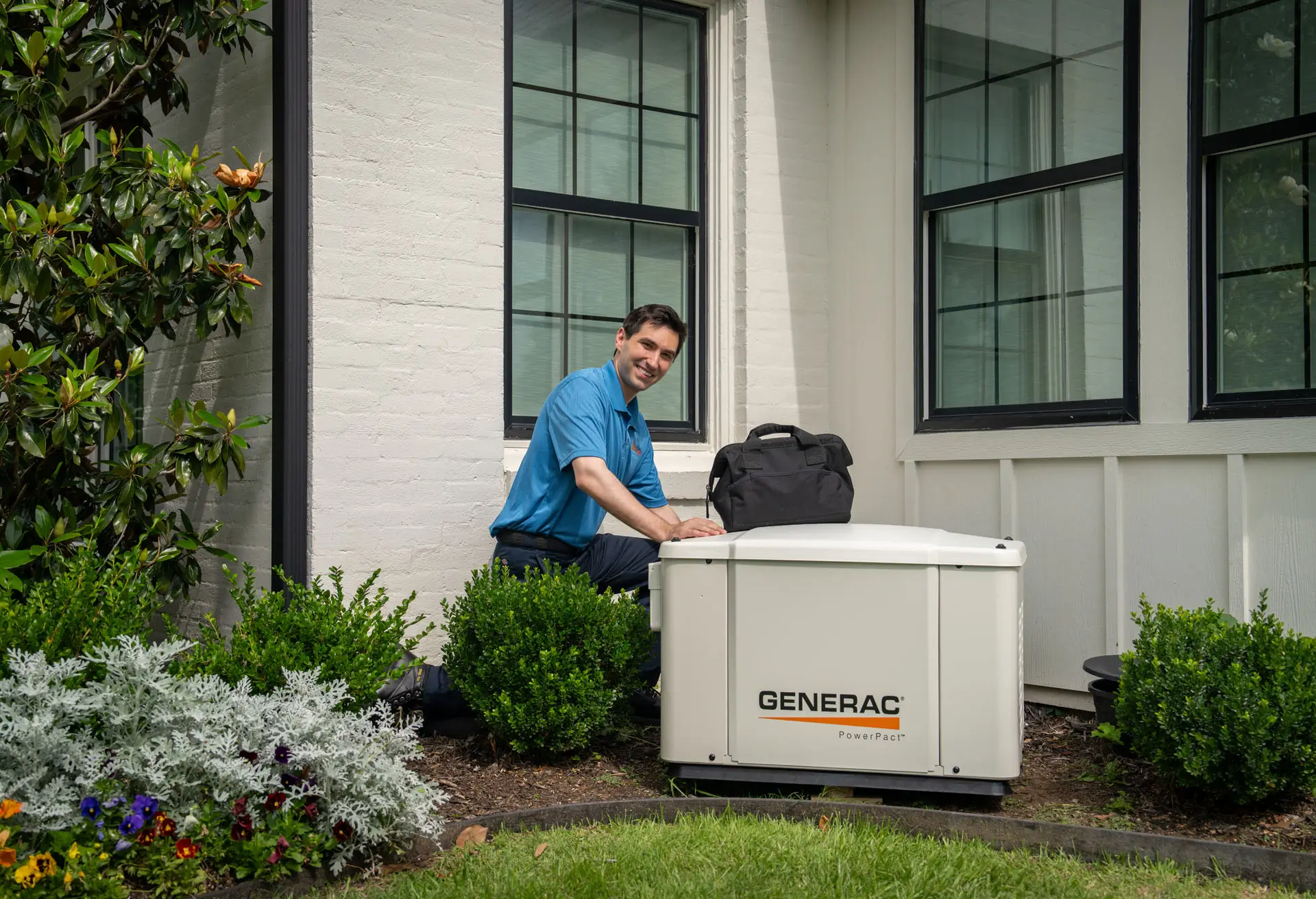 technician servicing home generator